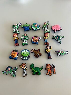 CROCS Toy Story Character Jibbitz - Green, Pink, Brown, Blue, Yellow. 19pcs